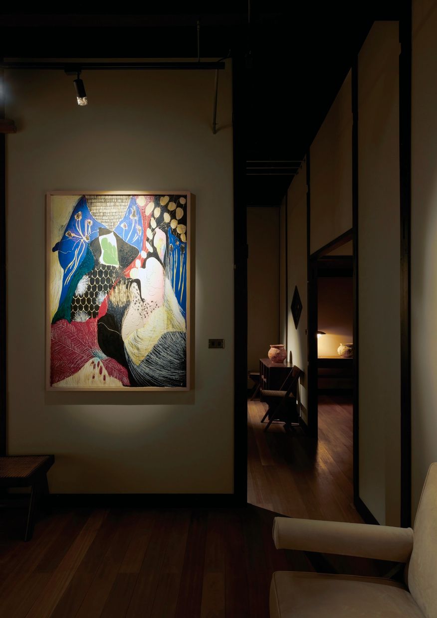 A corridor leading to Naotaka Hiro's painting, with rooms beyond.